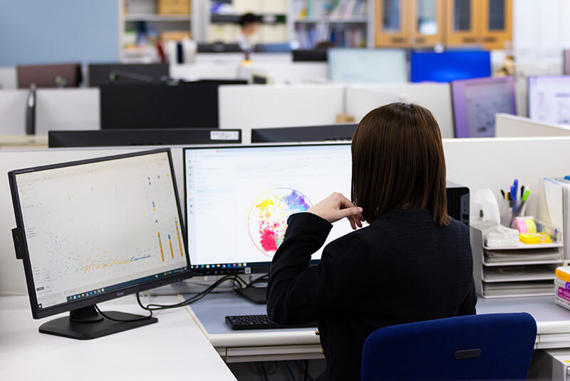 Female employee operating a computer